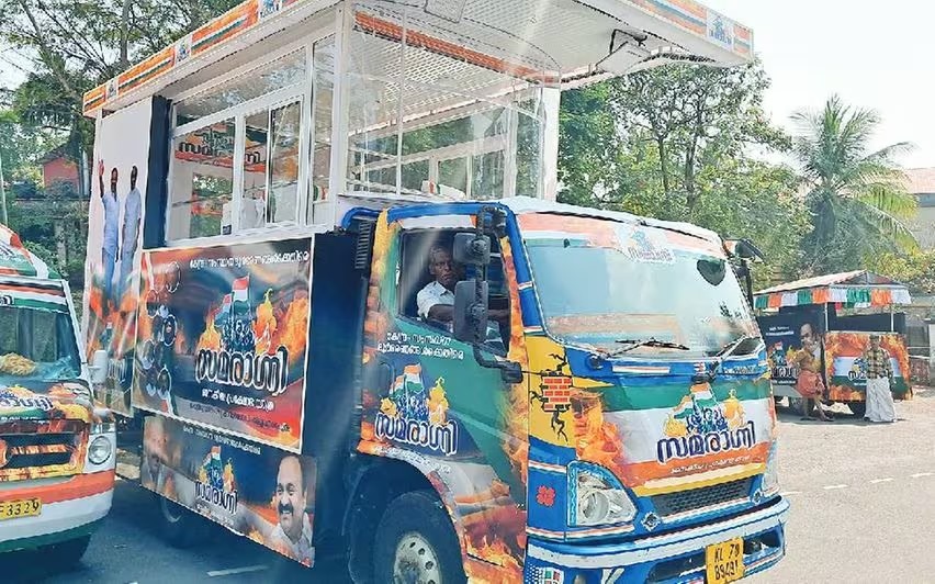 Sudhakaran and V.D. Satheesan's journey in mini lorry
