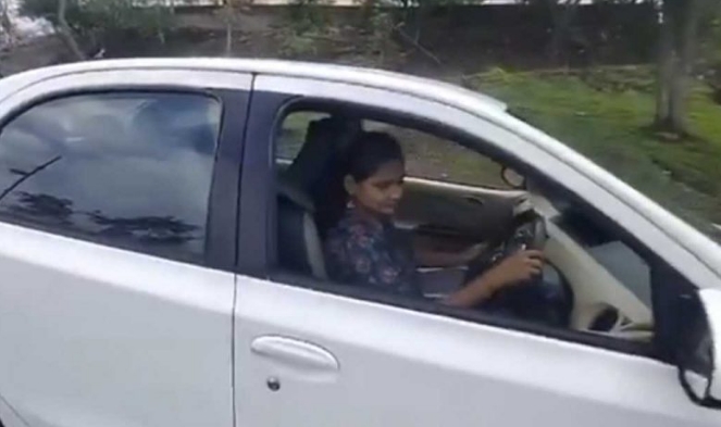 Woman dies after car overturns while taking reels