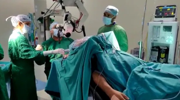 Patient looking at mobile phone during surgery; What happened later