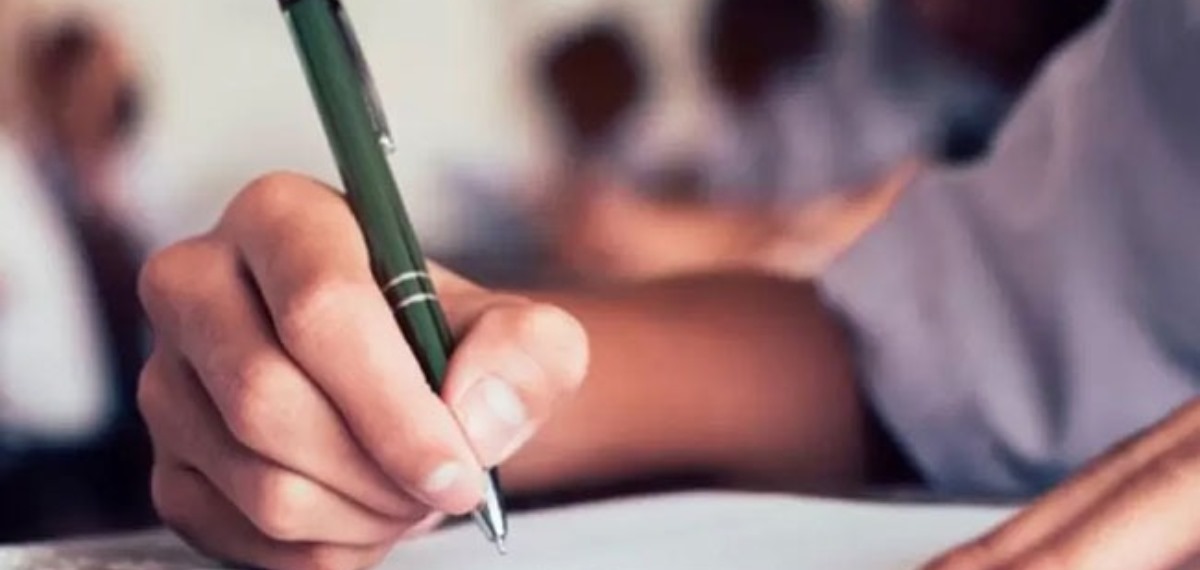 I sat outside the classroom and took the exam.