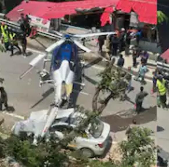 Helicopter lands in the middle of the road; locals shocked, house and car damaged